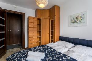 Posteľ alebo postele v izbe v ubytovaní Rent like home - Żeromskiego 10