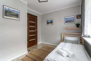 Posteľ alebo postele v izbe v ubytovaní Rent like home - Żeromskiego 10