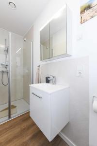 Koupelna v ubytování Ferienhaus Kuestenwind