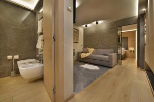 Koupelna v ubytování Hotel Compagnoni + 37 fotografií