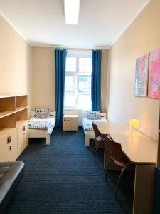Posteľ alebo postele v izbe v ubytovaní Chilli Hostel