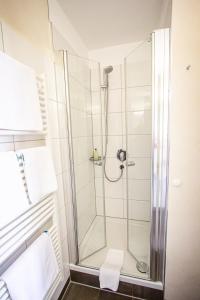 Koupelna v ubytování Hotel Spessartstuben + 37 fotografií