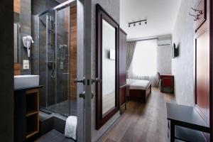Ett badrum på Abbey Road Hotel