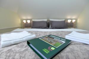 Postel nebo postele na pokoji v ubytování Hotel Livade