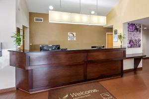 a lobby with a reception desk in a hotel room at Sleep Inn Henderson I-85 in Henderson