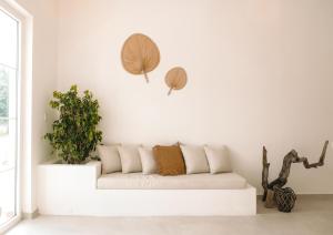 A seating area at RAW BEACH HOTEL