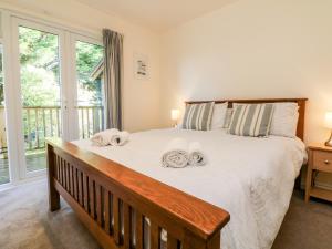 Postel nebo postele na pokoji v ubytování Stonewood Lodge