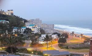 a view of a city and the ocean at 511 Umdloti Resort BREAKERS VIEW TO DIE FOR in Umdloti