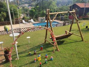 a group of toy figurines on a playground at Chácara - Usina Atibaia in Atibaia