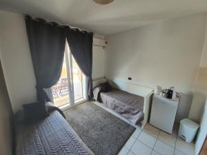 Postel nebo postele na pokoji v ubytování Guest House Brezza Marina