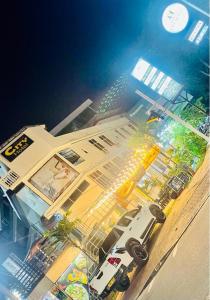 a view of a city with a building and a street at Airport City Hotel in Katunayake