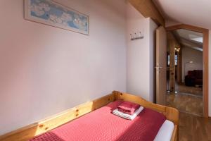 Postel nebo postele na pokoji v ubytování Alpen Chalet Alte Talstation
