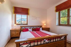 Postel nebo postele na pokoji v ubytování Alpen Chalet Alte Talstation