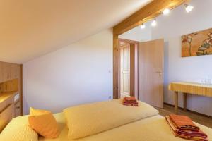 Postel nebo postele na pokoji v ubytování Alpen Chalet Alte Talstation