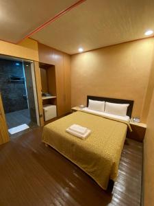 Postel nebo postele na pokoji v ubytování Hotel Lee-Chan