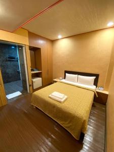 Postel nebo postele na pokoji v ubytování Hotel Lee-Chan