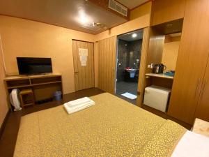 TV a/nebo společenská místnost v ubytování Hotel Lee-Chan