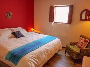 Postel nebo postele na pokoji v ubytování Casa LunaLoma - Boutique Apartments