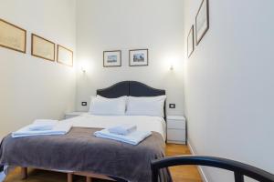 Posteľ alebo postele v izbe v ubytovaní Milan Retreats Cadorna Duomo