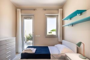 Posteľ alebo postele v izbe v ubytovaní i2elementi