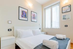 Posteľ alebo postele v izbe v ubytovaní Milan Retreats Cadorna Duomo