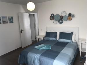 Postel nebo postele na pokoji v ubytování CASA BLANQUI