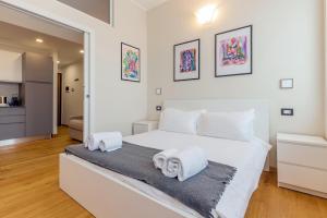 Posteľ alebo postele v izbe v ubytovaní Milan Retreats Cadorna Duomo