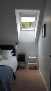Postel nebo postele na pokoji v ubytování Les 7 Tilleuls - Chambres d'hôtes