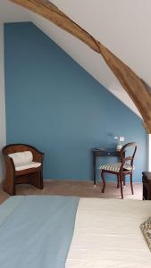 Postel nebo postele na pokoji v ubytování Les 7 Tilleuls - Chambres d'hôtes