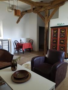 Posezení v ubytování Les 7 Tilleuls - Chambres d'hôtes