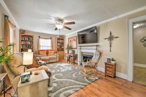 a living room filled with furniture and a ceiling fan at Belmont Retreat about 14 Mi to Dtwn Charlotte! in Belmont