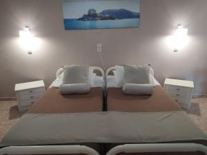 Letto o letti in una camera di Villa Soula Kaliva