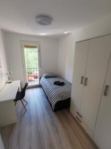 Posteľ alebo postele v izbe v ubytovaní Apartment Budin 2, Rijeka center