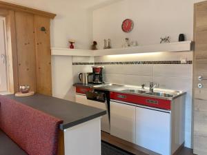 Kuchyň nebo kuchyňský kout v ubytování Musi Appartements