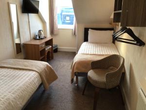 Кровать или кровати в номере parkhill guest house
