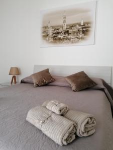 Postel nebo postele na pokoji v ubytování B&B Curtopassi