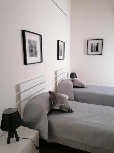 Postel nebo postele na pokoji v ubytování B&B Curtopassi
