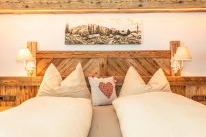 Postel nebo postele na pokoji v ubytování Pension Berghof
