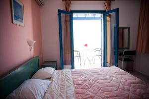 Posteľ alebo postele v izbe v ubytovaní Akti Rooms