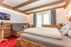 TV a/nebo společenská místnost v ubytování Pension Berghof