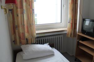 TV a/nebo společenská místnost v ubytování Hotel Lilienhof