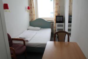 Postel nebo postele na pokoji v ubytování Hotel Lilienhof