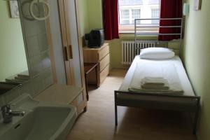 Postel nebo postele na pokoji v ubytování Hotel Lilienhof