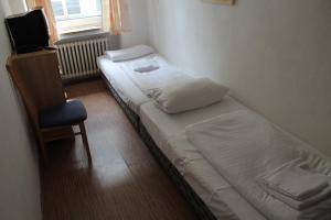 Postel nebo postele na pokoji v ubytování Hotel Lilienhof