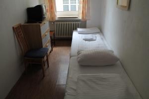 Postel nebo postele na pokoji v ubytování Hotel Lilienhof