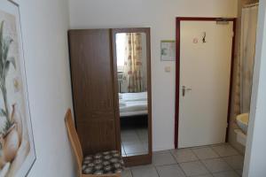 Postel nebo postele na pokoji v ubytování Hotel Lilienhof