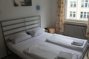 Postel nebo postele na pokoji v ubytování Hotel Lilienhof