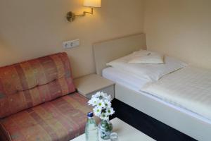 Postel nebo postele na pokoji v ubytování Hotel Lilienhof