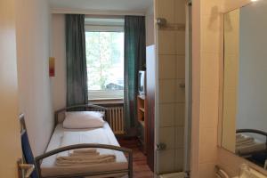 Postel nebo postele na pokoji v ubytování Hotel Lilienhof