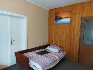 Letto o letti in una camera di Sétány Apartmanház Fonyód